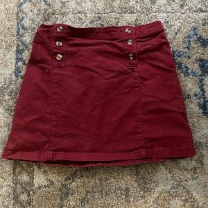 red velvet skirt with tortoise buttons. great condition worn once